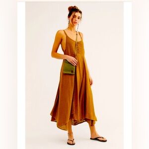 Free people New Moss Green simple beauty dress in size medium.